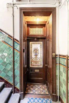 a door to a building with a painting on it at Boutique West End Apartment - 'The Nook' in Glasgow