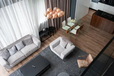 an overhead view of a living room with a couch and chairs at Stunning 3 Bed Penthouse in West End in Glasgow