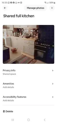 a screenshot of a kitchen with a picture of a kitchen with a stove at Garden homely house in Cardonald