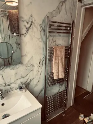 a bathroom with a sink and a shower at Lazy Days in Moffat