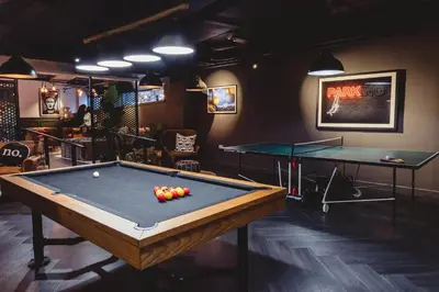 a room with a pool table and two ping pong tables at For Students Only Portsburgh Court Edinburgh in Edinburgh