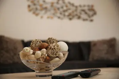 a glass bowl filled with eggs on top of a table at Edinburgh Pearl Apartments - Dalry House Residence in Edinburgh