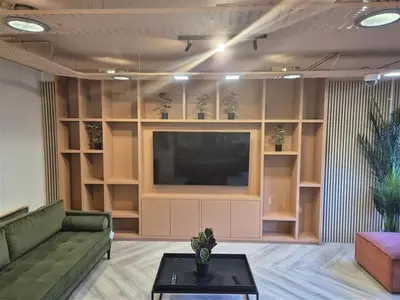 a living room with a couch and a flat screen tv at For Student Only Student Roost Gibson Street in Glasgow