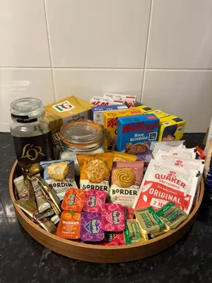 a basket filled with different types of food and snacks at View of the Isles in Largs
