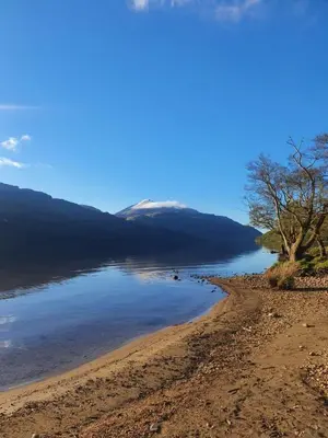 a view of the shore of a lake at Inveruglas Farm Cottage in Arrochar