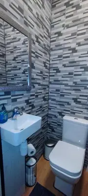 a bathroom with a white toilet and a sink at Flat in Central Edinburgh New Town , Lothian Road Heart of Edinburgh Flat Sleeps 4 in Edinburgh
