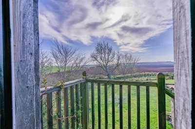 an open gate with a view of a field at 1 Bed in Methven oc-v30533 in Methven