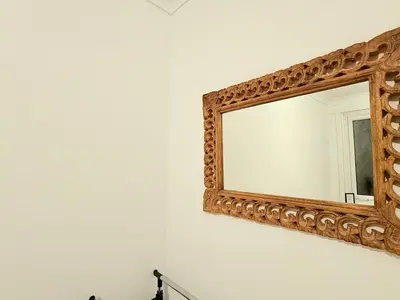 a mirror on a wall next to a white wall at RF-Entire House-Central Scotland-Falkirk, Self-Check-in , Pet-friendly and with Parking in Falkirk