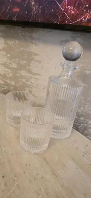 three clear plastic cups sitting on a table at 2 Bedroom Sofa bed in livingroom Castle View 1st floor sleeps 6 in Edinburgh