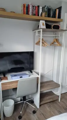 a desk with a computer and a chair in a room at Innisfail Edi - double room with private bathroom in Edinburgh
