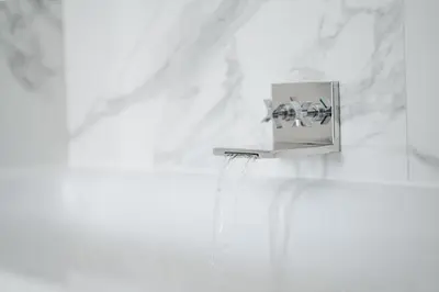 a lightswitch on a wall in a white room at Prestigious Townhouse close to Princes Street in Edinburgh