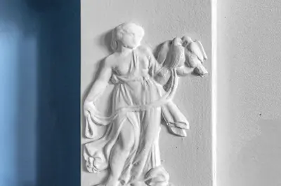a white statue of a woman holding a bird at Super Spacious 4 Bed, sleeps 6 in Edinburgh