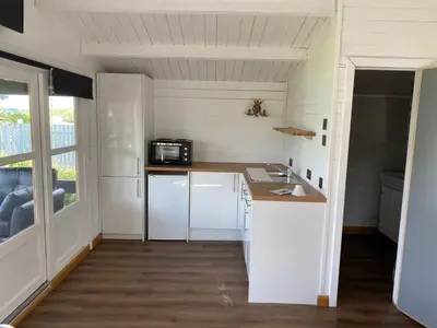 a small kitchen with a counter and a microwave at Lochside-1Bed-Pet Friendly-Amazing views in Alexandria