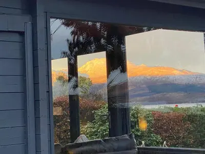 a window of a house with a view of a mountain at Lochside-1Bed-Pet Friendly-Amazing views in Alexandria