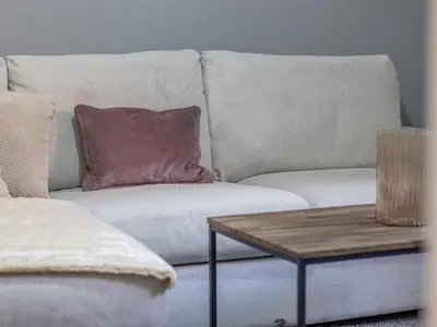 a living room with a couch and a coffee table at Happy Haven Home, West End - Pass the Keys in Glasgow