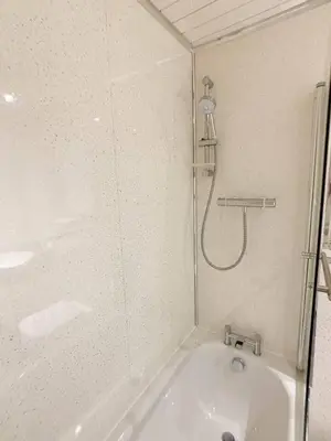a bathroom with a shower and a bath tub at Glasgow 2bd near Hydro SECC City Centre Great Location in Glasgow