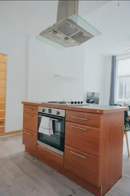 a kitchen with a stove and a stove top oven at 2 bed Renfield st City Center in Glasgow