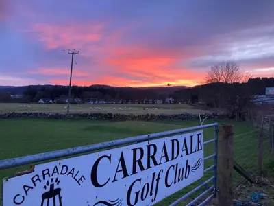 a sign that reads carapeake golf club at sunset at Holiday home, Carradale in Carradale