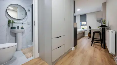 a bathroom with a sink and a toilet and a mirror at For Students Only Clyde Court Glasgow in Glasgow