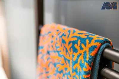 a close up of a colorful sweater on a chair at 3Bed Home Sleeps 6 w Private Parking in Dunfermline
