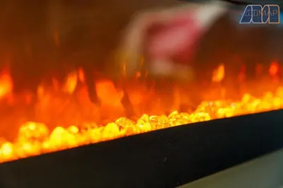 a close up of a grill with fire at 3Bed Home Sleeps 6 w Private Parking in Dunfermline