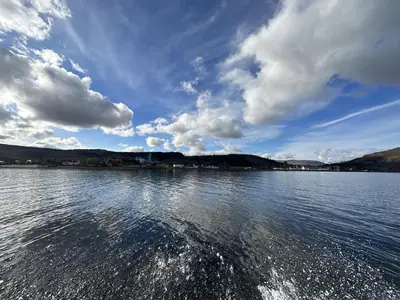 a view of the water from a boat on a lake at Traditional Inveraray Cottage - Amazing Loch Views in Inveraray