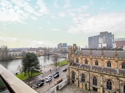a view from the roof of a building with a river at Metropolitan St Andrews Cathedral View - Pass the Keys in Glasgow