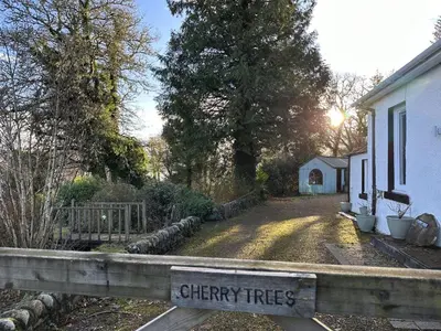 a sign that reads cherry fires outside a house at Cherry Trees in Inveraray