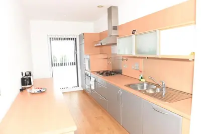 a kitchen with a sink and a counter at Glasgow Hydro Apt with Great Views in Glasgow