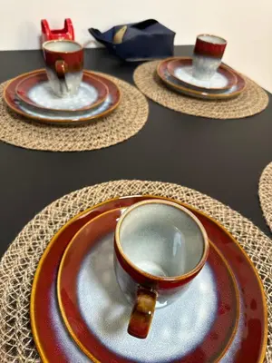 a table with three plates with cups on them at Private main door Two Bedrooms Apartment in Edinburgh
