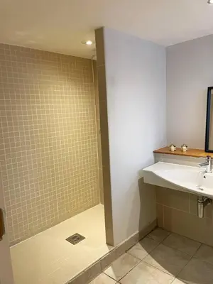 a bathroom with a sink and a shower at SEC Hydro Duplex in Finnieston in Glasgow