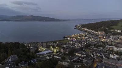 an aerial view of a city and a body of water at Castle Street Apartments - Luxury Kilchattan Apartment in Rothesay