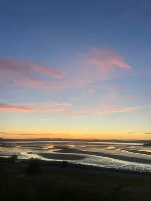 a view of a river at sunset at Haymarket Flat in Edinburgh