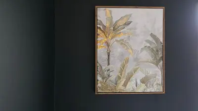 a picture of a painting on a wall at The Ansi8 in Livingston