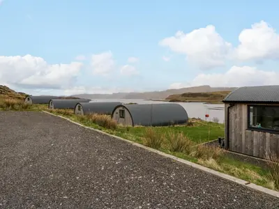 a row of domes on the side of a road at WildLuing in Oban