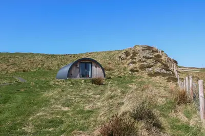 a tiny house on top of a hill at Creags in Oban