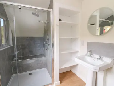 a bathroom with a shower and a sink at Losal in Oban
