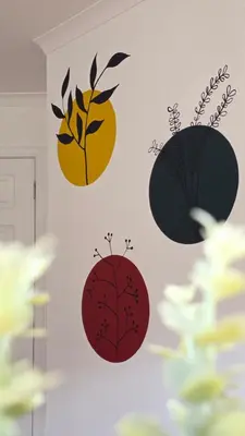 a set of four wall decals on a wall at The Ansi9 in Livingston