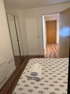 a bedroom with a bed with a towel on it at Welcome to Home Away From home in Moffat