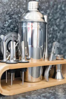 a mixer and other kitchen utensils on a wooden shelf at Lovely Haymarket Apartment - Central Edinburgh in Edinburgh