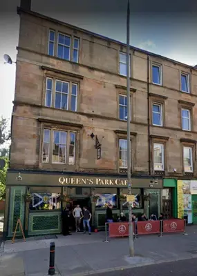 a building on the corner of a street at Pass the Keys Victoria Road Queens Park View in Glasgow