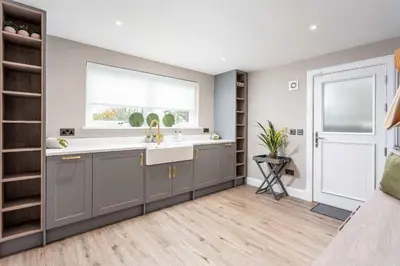 a bathroom with a sink and a window at No36 South Beach - Donnini Apartments in Troon