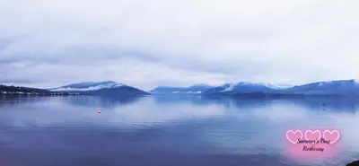 a picture of a lake with mountains in the background at Summer's Bay in Rothesay