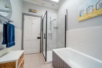 a bathroom with a shower and a bath tub at 2 Bed in Moffat oc-a32121 in Moffat