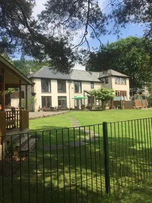 a fence in front of a house at Riverside House in Callander