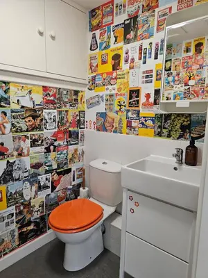a bathroom with a toilet and a sink at The Robin House in Ravelston in Edinburgh