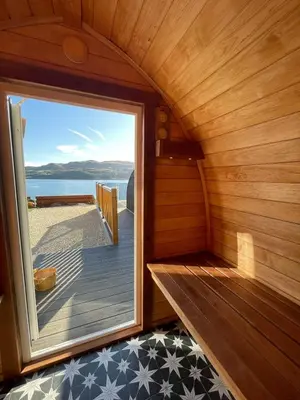 a room with a window in a sauna at Luxury Pod and Sauna with Fantastic Sea Views in Oban