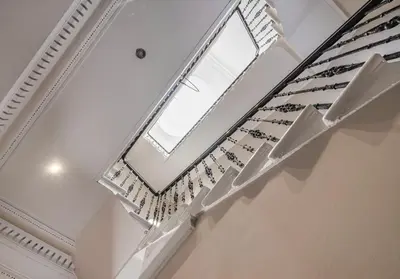 a skylight in the ceiling of a building with birds at Cairn BNB Introduces Blythswood Apartments - Experience exceptional luxury living in Glasgow's most desirable location in Glasgow