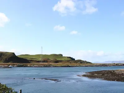 a view of a river with hills in the background at Bathach Beag in Oban