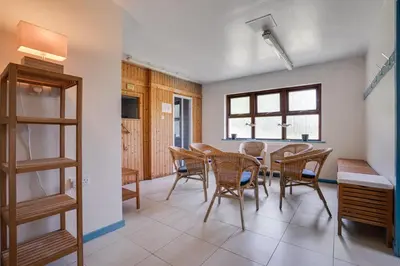 a dining room with a table and chairs at Penninghame Estate - Earl's Library in Challoch